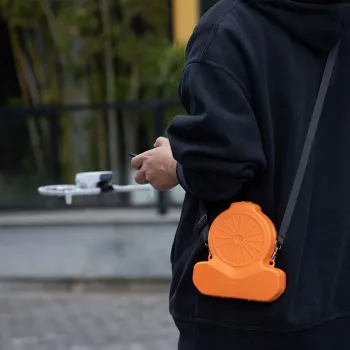Cutie rigidă de transport SUNNYLIFE pentru drona DJI Flip cu curea - portocaliu / FP-SN953-C